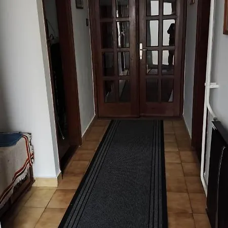 Casa de hóspedes Hársfaapartman és Vendégház